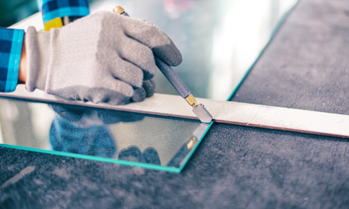 Glass being cut