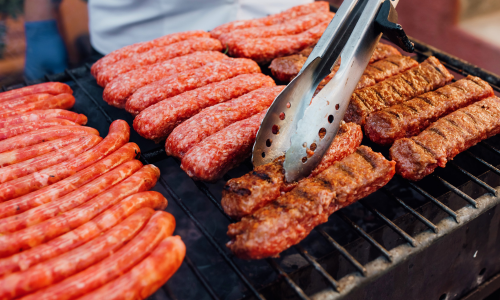 Sausages on a grill